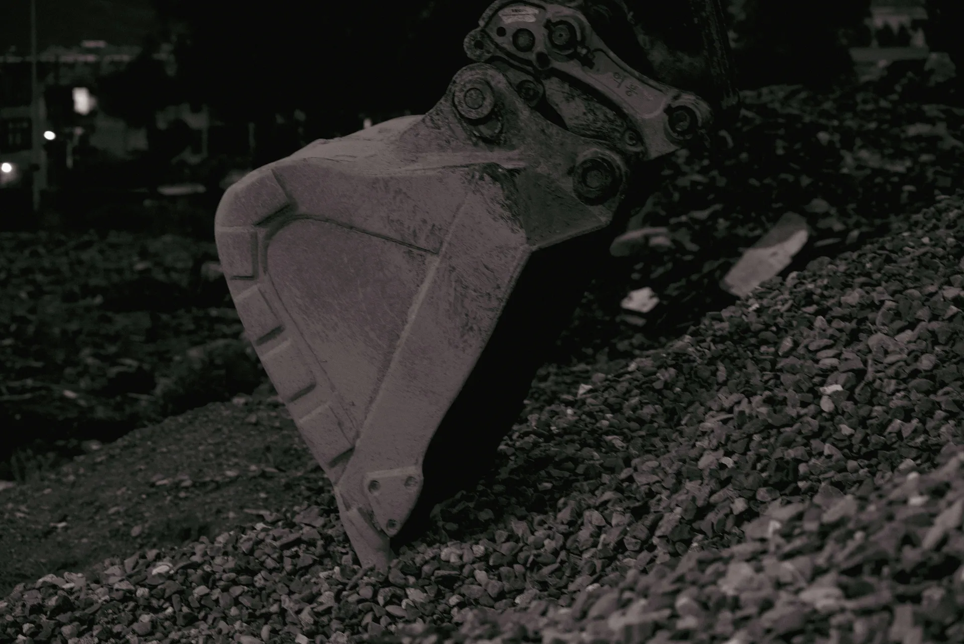 Professional contractors paving a new residential driveway with modern equipment