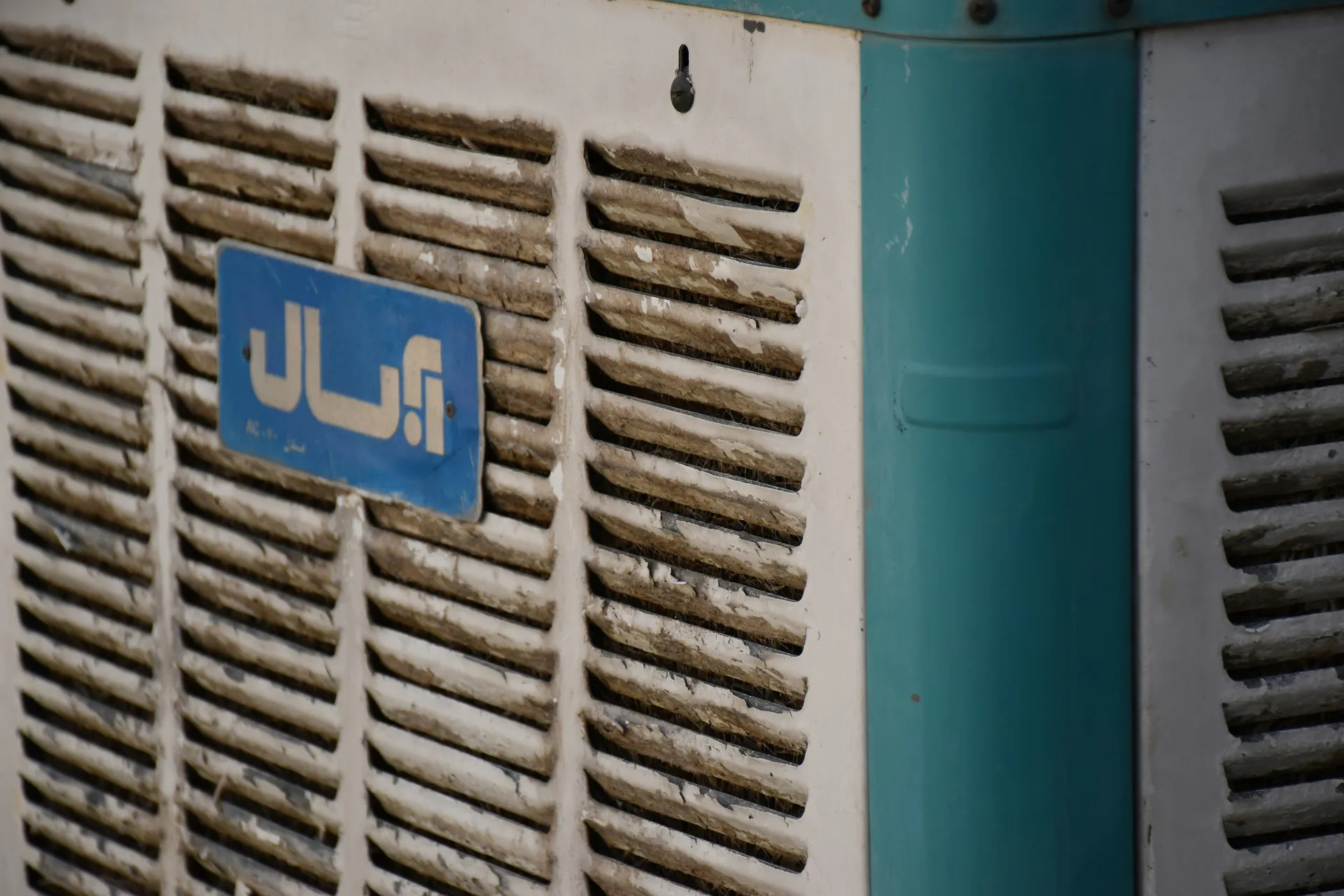 A side-by-side image showing a finger pointing to a furnace power switch and a person holding a dirty, clogged air filter.